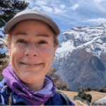 Tour Manager Nic Wilson standing at mountain