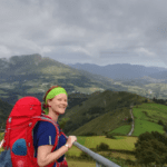 Amanda Collis standing on a mountain